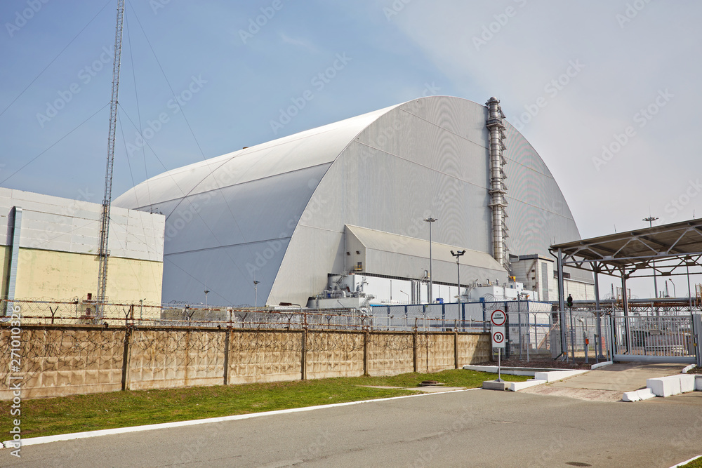 Reactor 4 at the Chernobyl nuclear power plant with a new confinement. Global atomic disaster. Chernobyl Exclusion Zone.