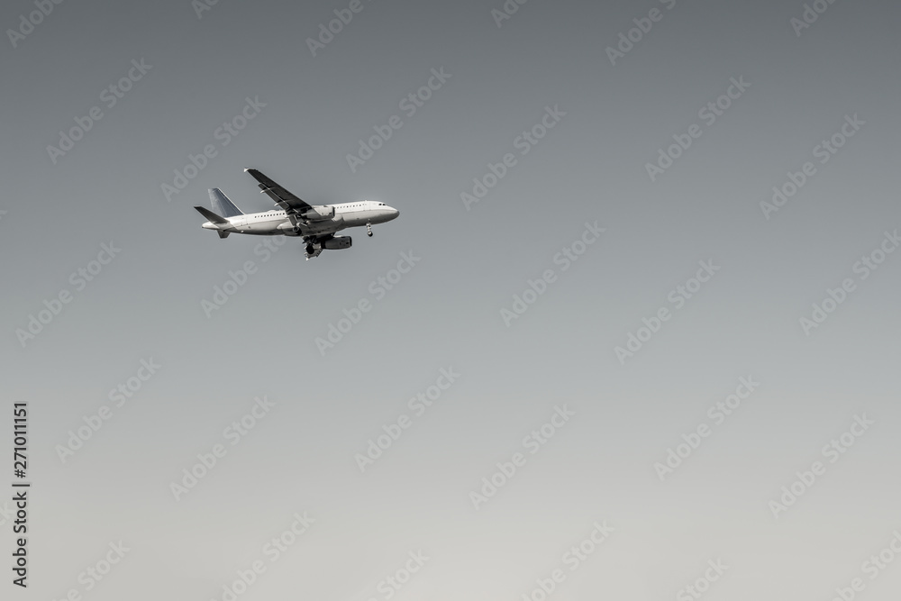Black and White airplane departure flying in clear day