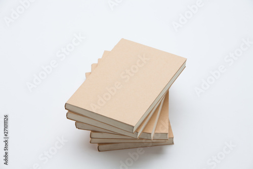  Stack of brown books isolated 