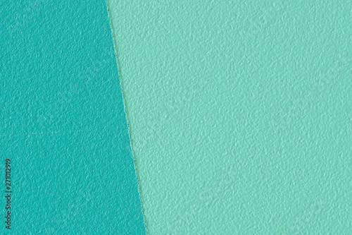Macro image of a teal painted wooden panel