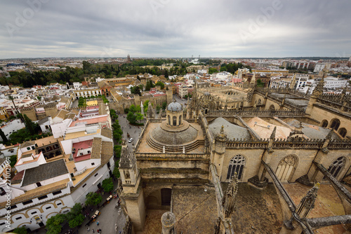 View south over Seville Cathedral roof from Giralda to Alcazar palace
