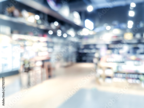 Blur background with bokeh of Supermarket store photo