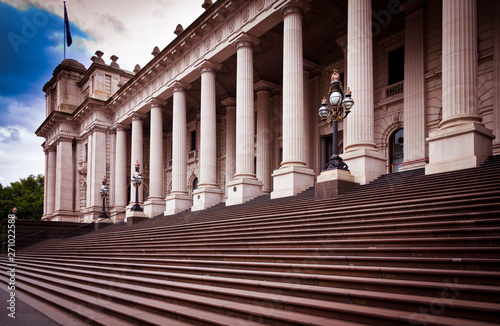 This building is Melbourne Parliament House in Victoria, Australia. From 1901 to 1927 it was used by the National Government before it moved to Canberra.