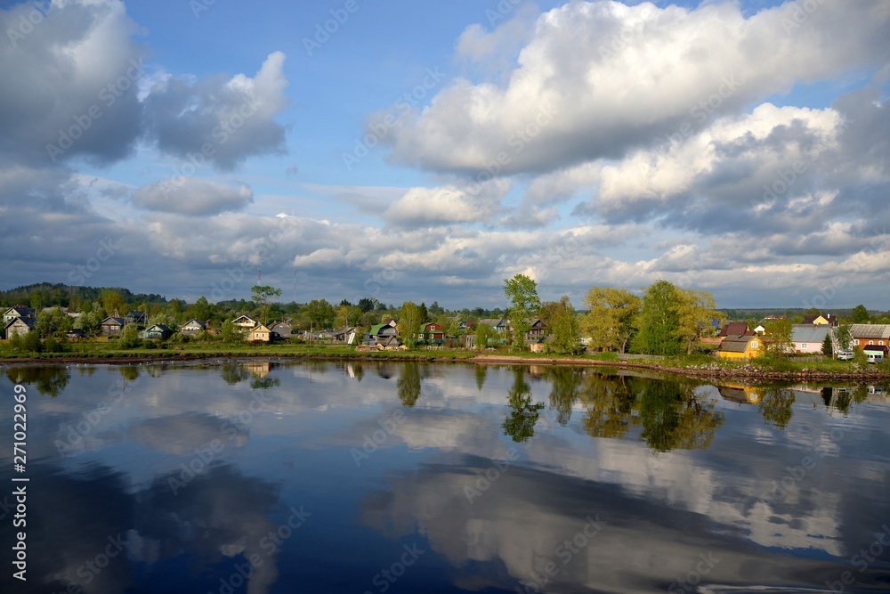 Picturesque banks of the river Svir in the rays of the sunset