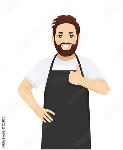 Handsome man in black apron standing showing thumb up isolated vector illustration