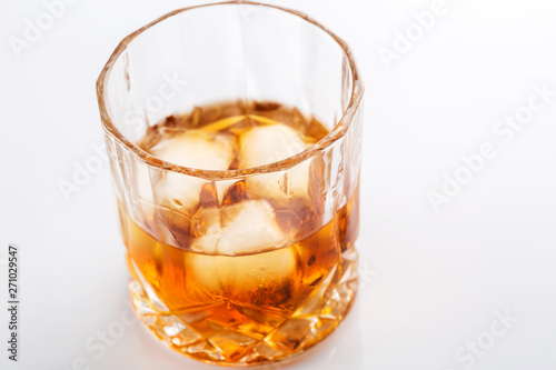 Whiskey with ice cubes.