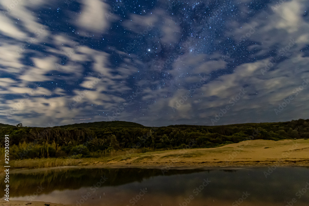 Clouds and Stars Nightscape at the Beach