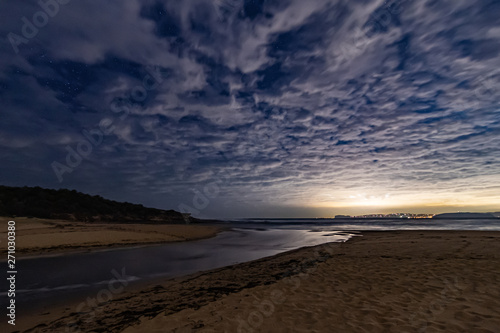 Clouds and Stars Nightscape at the Beach