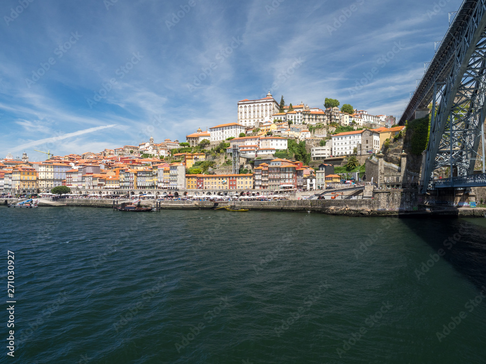 Scenic view of the Porto Old Town pier architecture and bridge Dom Luis over Duoro river in Porto, Portugal. May 2019