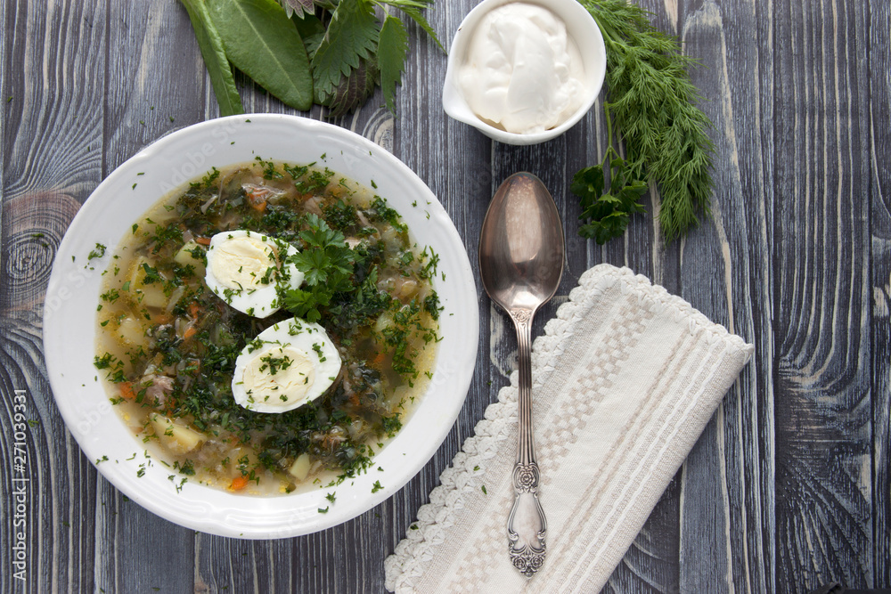 Nettle soup with sorrel in a plate Nettle soup with sorrel in a plate
