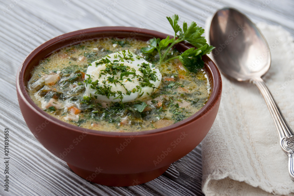 Soup with vegetables and spring greens and egg Soup with vegetables and spring greens and egg