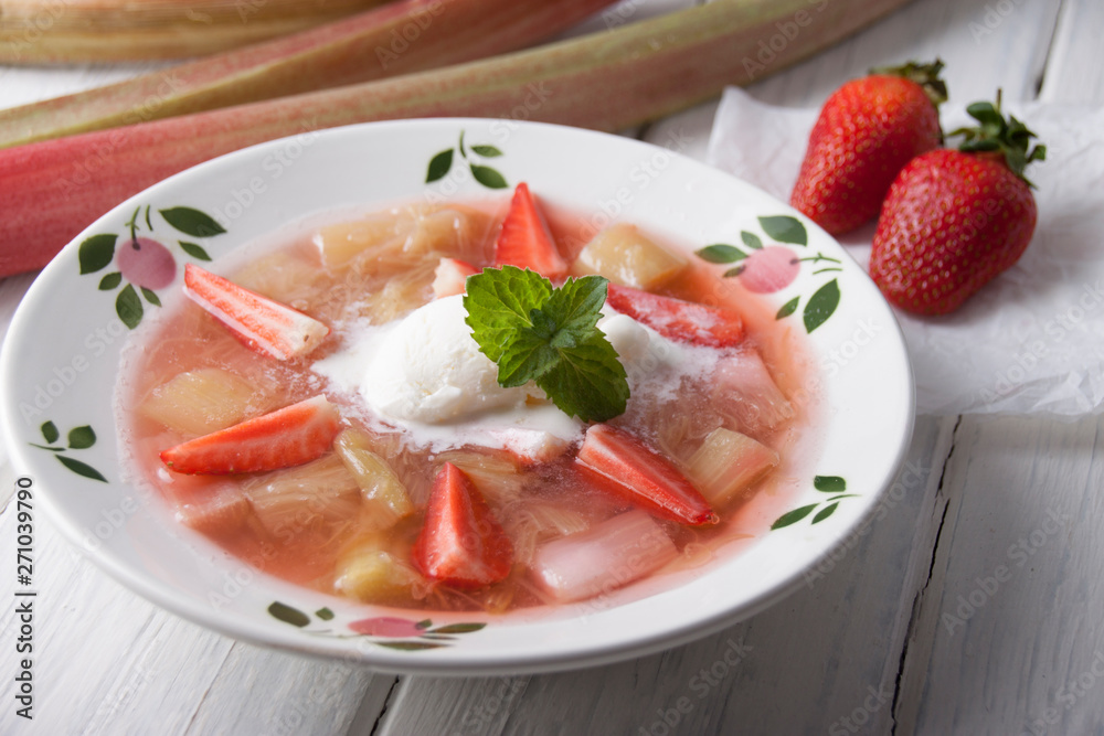 Rhubarb soup with strawberries and ice cream in Rhubarb soup with strawberries and ice cream in