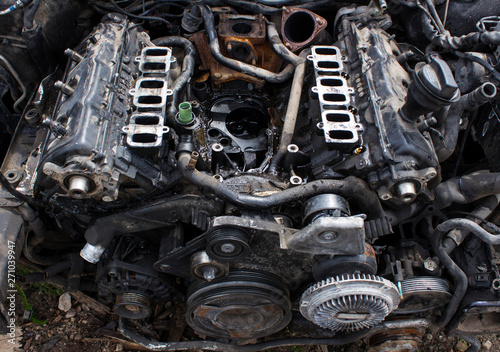 disassembled V6 diesel engine in the car © Boriss