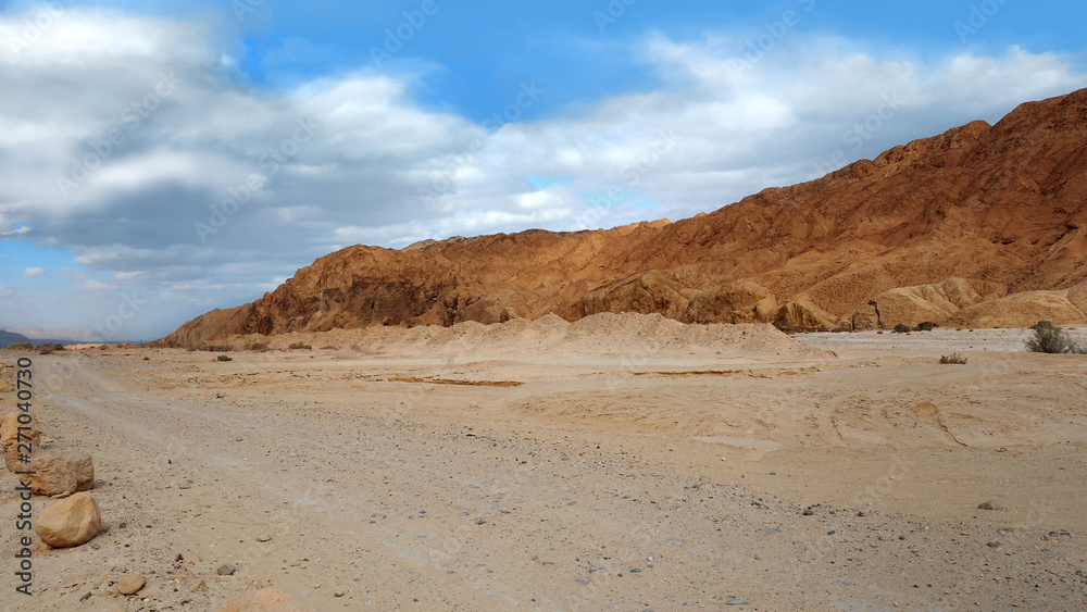 White sandy road in desert