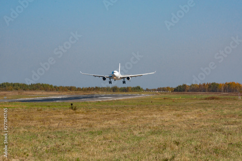 KHABAROVSK, RUSSIA - SEP 29, 2018: Airbus A330-200 VP-BUB Nordwind Airlines lands at the airport of Khabarovsk.
