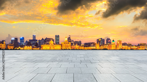 Shanghai bund city skyline and empty square floor at night,panoramic view