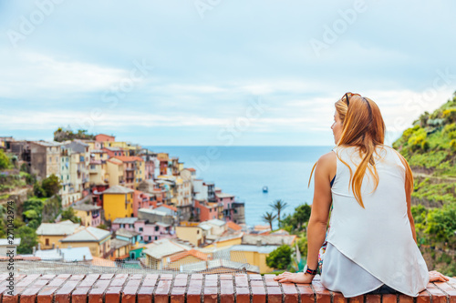 Fototapeta Naklejka Na Ścianę i Meble -  Young woman traveling through Europe, Cinque Terre, Italy