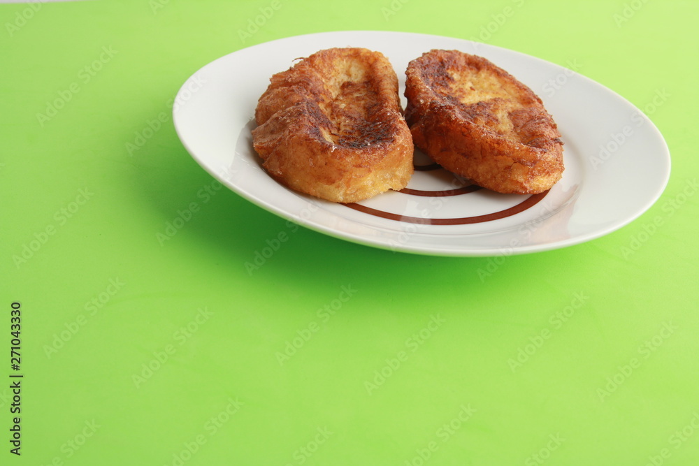 The torrijas are a typical Spanish dessert that is eaten for Easter, are made with milk and bread The torrijas are a typical Spanish dessert that is eaten for Easter, are made with milk and bread