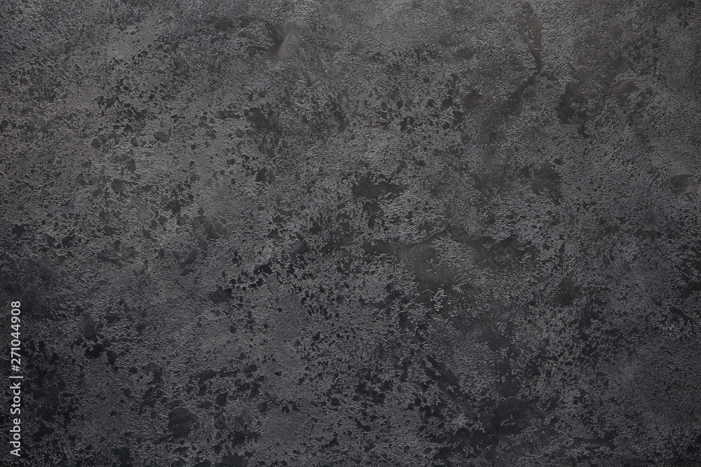 Textural gray background with the transition to black.View from above. Copy space.