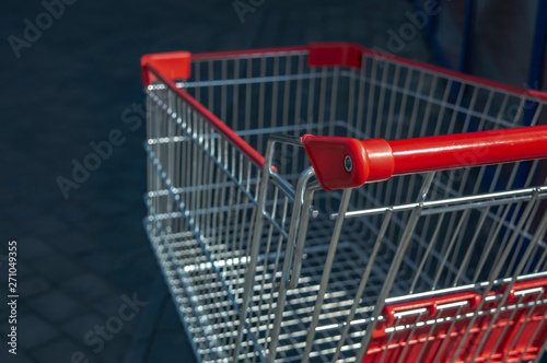 trolley from supermarket on the street on a sunny day closeup