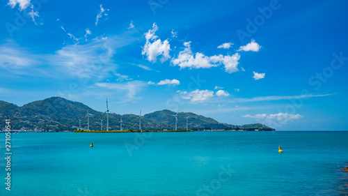 The Seychelles. View of the ocean from the island Mahe. Wind turbines photo