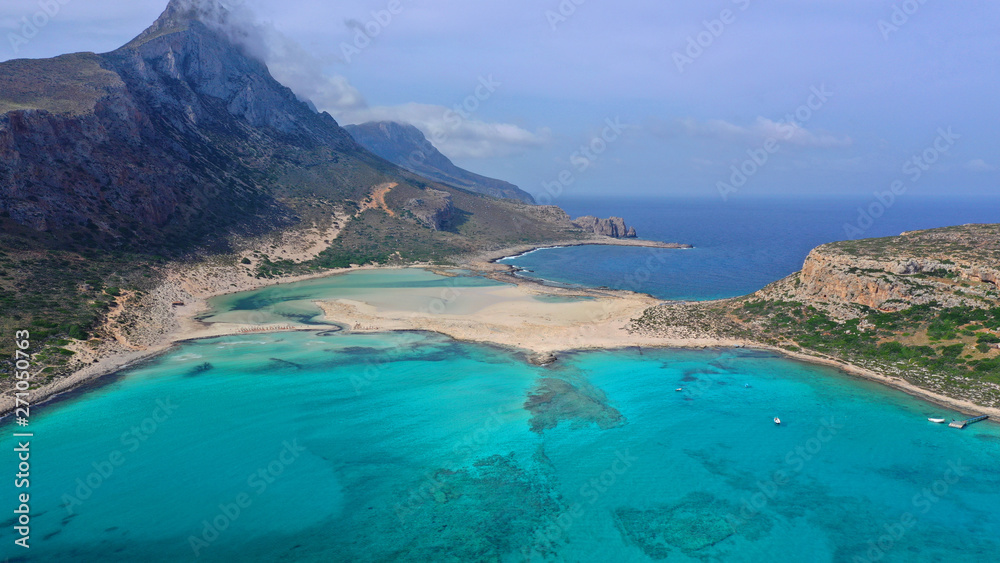 Aerial drone panoramic view of iconic azure turquoise Balos beach lagoon near Gramvousa island and pure white sand, North West Crete island, Greece