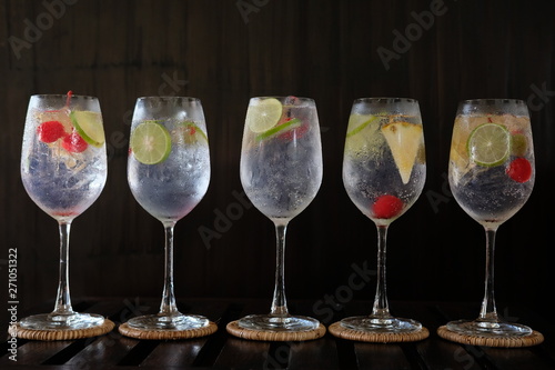 summer drinks of gin tonic alcoholic cocktails on table