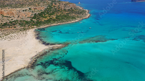 Aerial drone panoramic view of iconic azure turquoise Balos beach lagoon near Gramvousa island and pure white sand, North West Crete island, Greece © aerial-drone