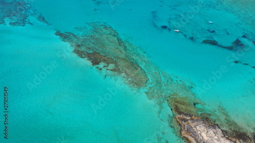 Fototapeta Naklejka Na Ścianę i Meble -  Aerial drone panoramic view of iconic azure turquoise Balos beach lagoon near Gramvousa island and pure white sand, North West Crete island, Greece