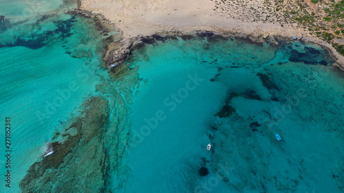 Aerial drone bird s eye view photo of tropical caribbean paradise bay and lagoon with white sandy beach and turquoise clear sea