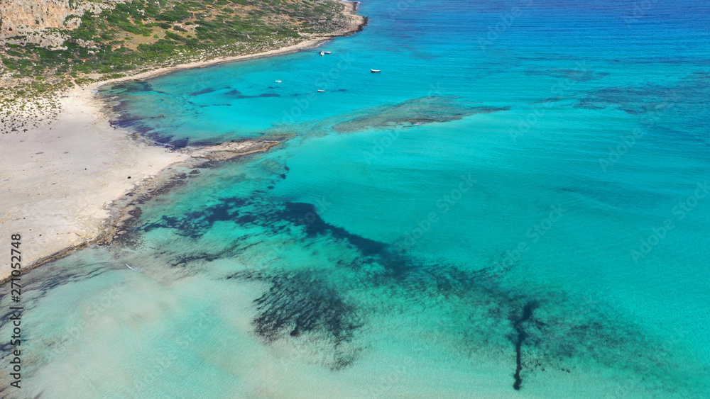 Obraz premium Aerial drone panoramic view of iconic azure turquoise Balos beach lagoon near Gramvousa island and pure white sand, North West Crete island, Greece