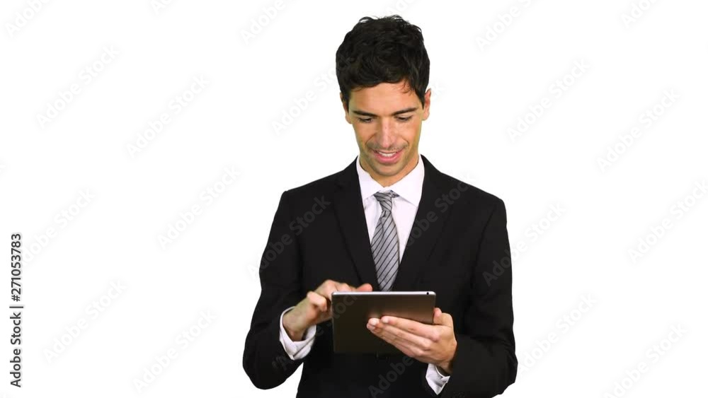 Portrait of a young businessman using a tablet computer Portrait of a young businessman using a tablet computer