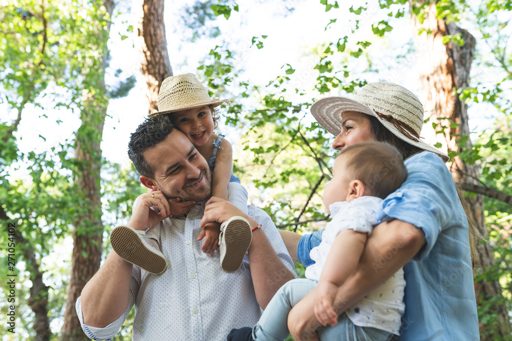 Happy Hispanic Family Having Fun Together Outdoors. Happy Hispanic Family Having Fun Together Outdoors.