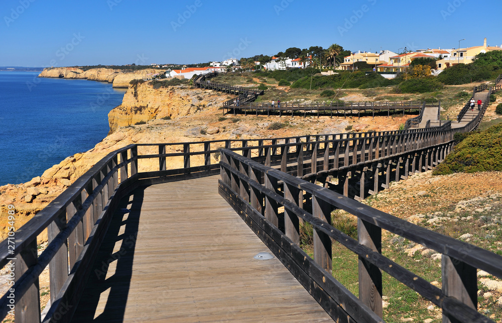 Fototapeta premium Wooden path of touristic route in Carvoeiro