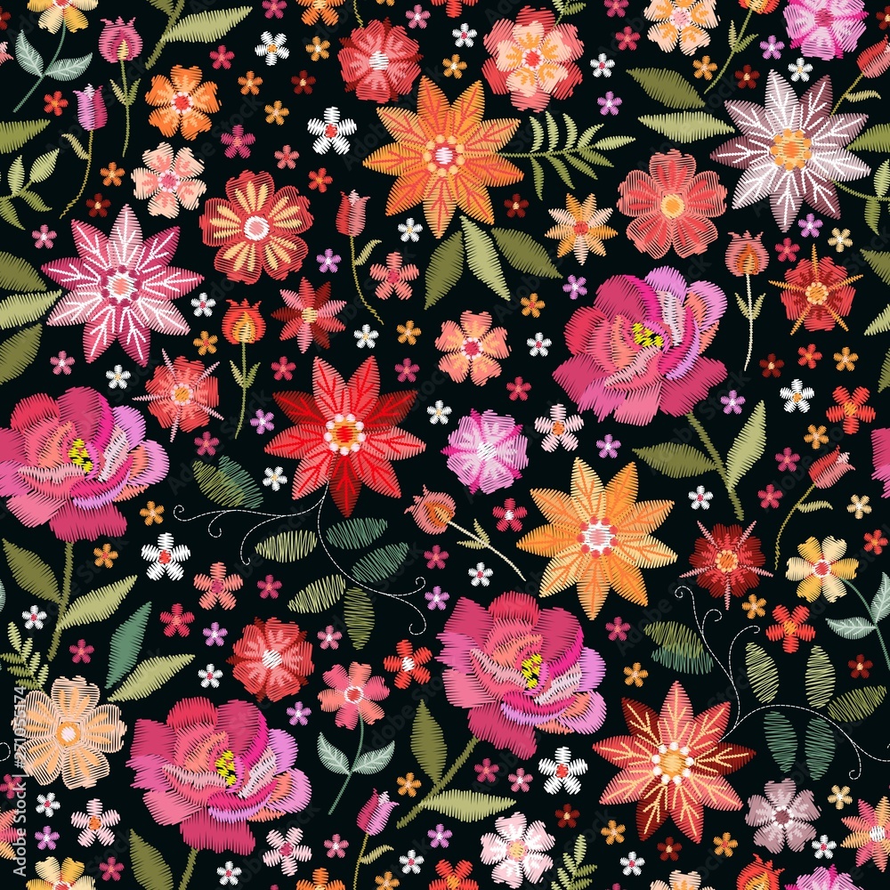 Embroidery seamless pattern with bright flowers on black background. Fashion design for fabric, textile, wrapping paper. Fancywork floral print.