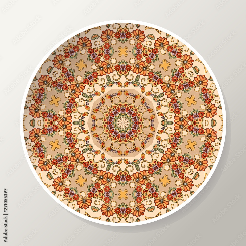 Decorative plate with mandala in ethnic style. Oriental round ornament with flowers and birds.