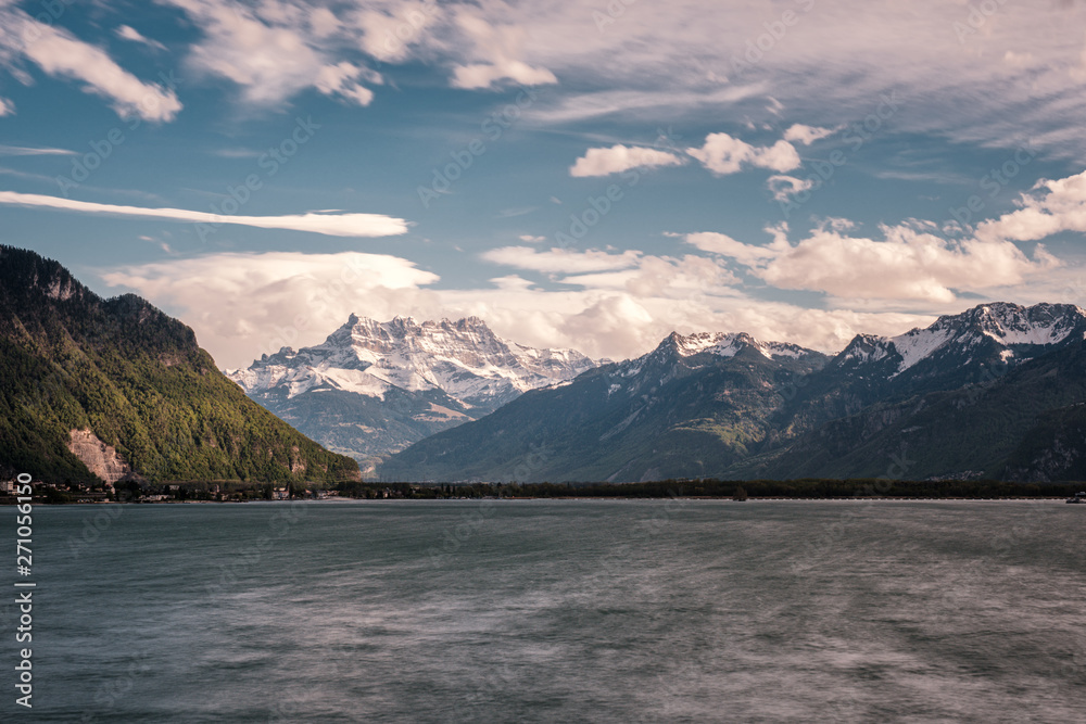 Lake Geneva and snow capped mountains in Switzerland
