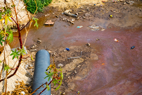 Foto pollution in the city on river