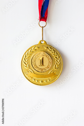 Gold silver bronze medals. Champion winner of the metallic medal award, close-up on a white background.