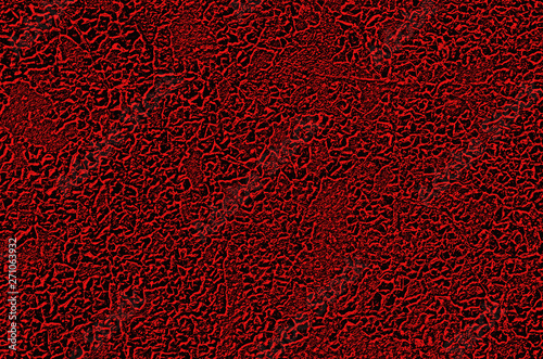 The background consists of an abstract texture of red and black colors.