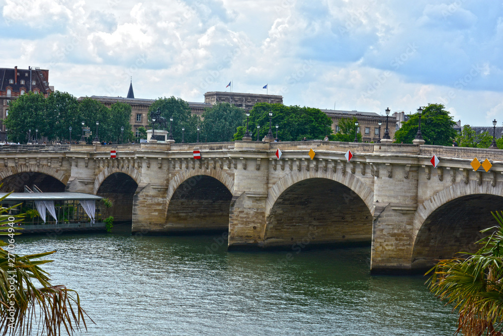 PARIS, FRANCE - MAY 25, 2019:  bridge Pont Neuf, the oldest standing bridge across the river Seine in Paris, France