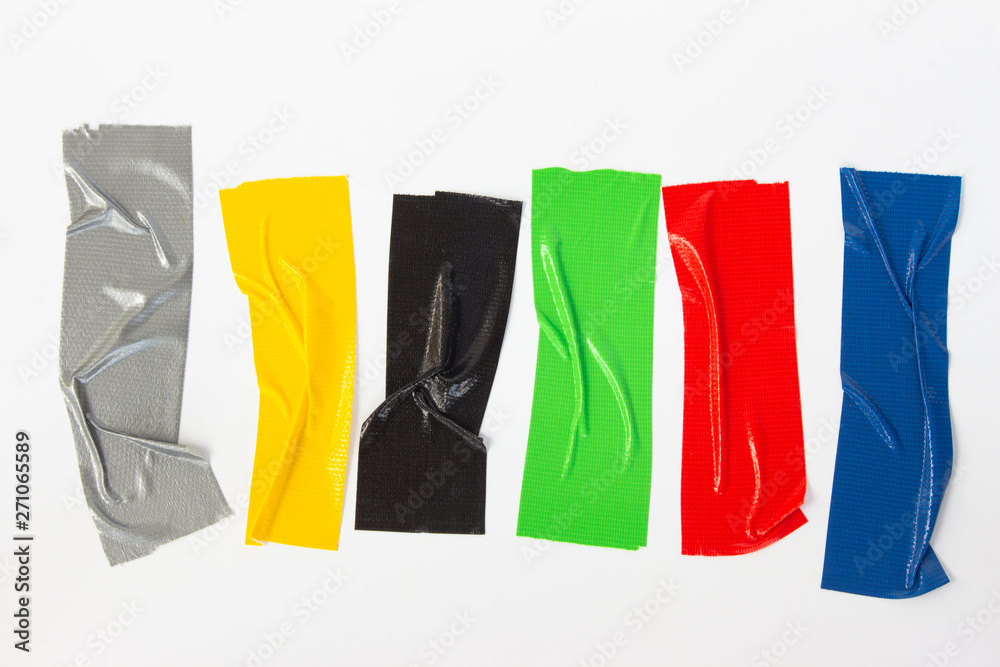 Set of gray, green, black, yellow, red, blue tapes on white background. Torn horizontal and different size sticky tape, adhesive pieces.