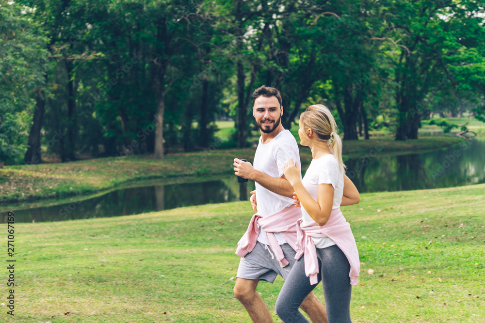 Lover couple and running in the Park
