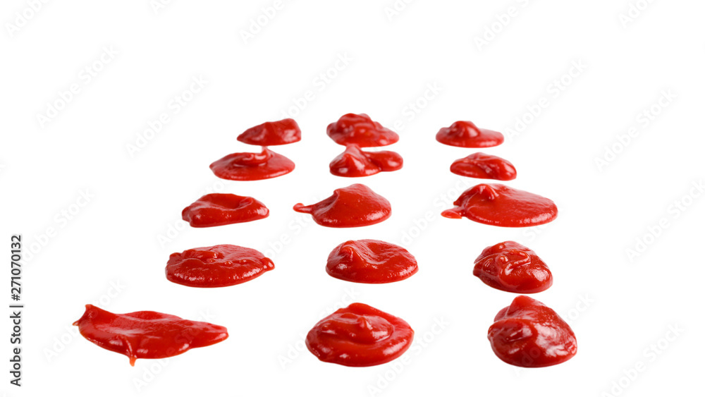 Red sauce splashes isolated on white background. Ketchup. Red sauce splashes isolated on white background. Ketchup.