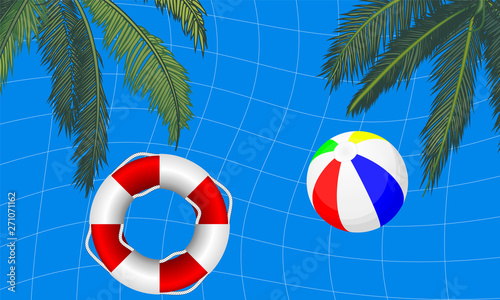 pool with palm trees and a life buoy beach ball