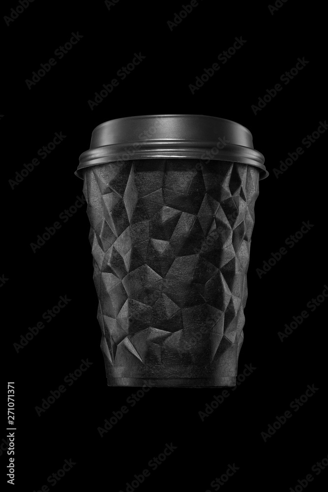 A cup of textured coffee geometry with a black cap. A cup of textured coffee geometry with a black cap.
