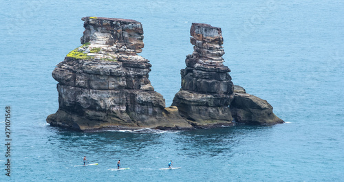 Landscape View of Twin Candlestick Islets (Husband and Wife Rocks) at the North Coast of Taiwan, Jinshan District , New Taipei, Taiwan photo