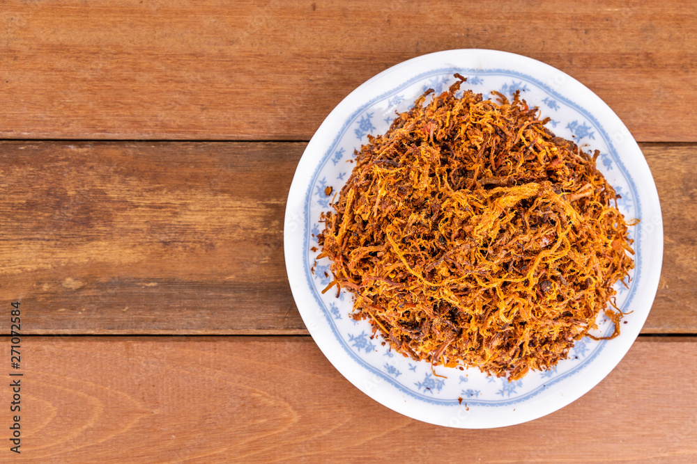 Serunding, dried meat floss made of beef or chicken Serunding, dried meat floss made of beef or chicken