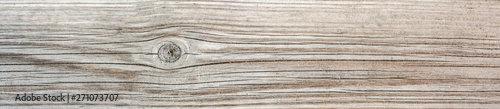texture of antique floorboards, old dried wood with a lot of cracks and peeling fibers, closeup abstract background