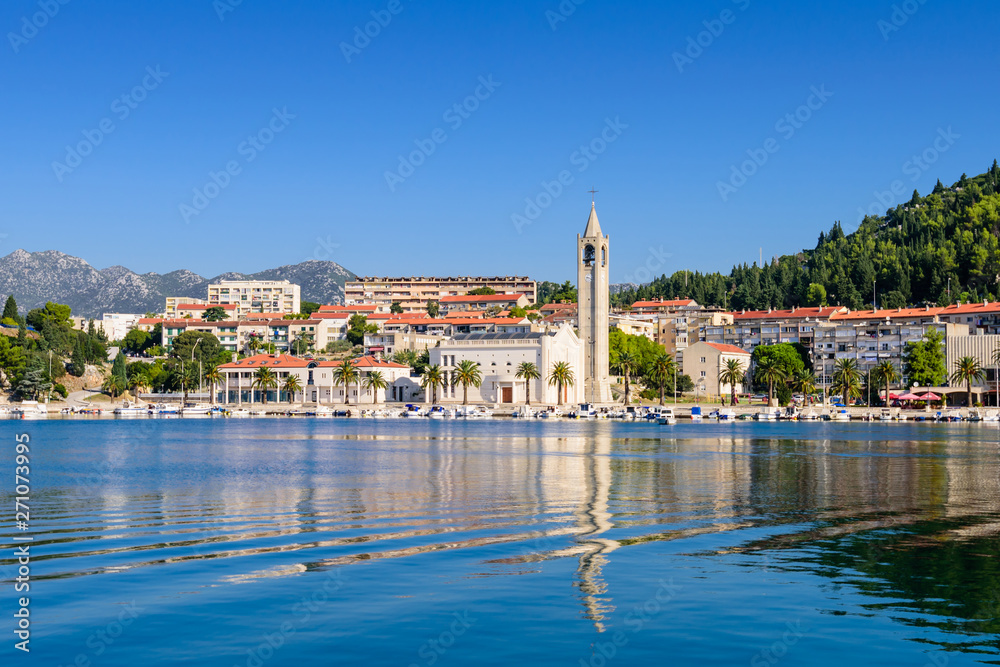 Cityscape of Ploce with the Catholic Church. Ploče is a city in the region of Split-Dalmatia County, Croatia
